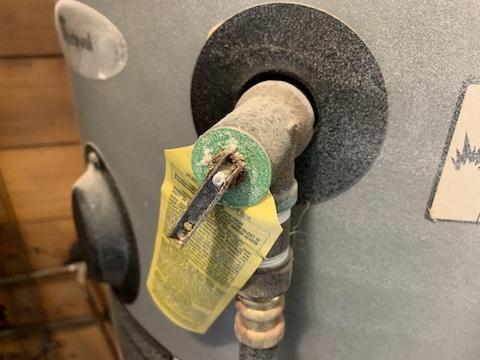 The TPR (pressure relief) valve on the main water heater is frozen closed. Recommend immediate repair or replacement of the valve.