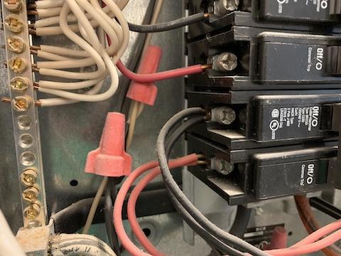 Double tapped wiring is ok if the circuit breaker is designed for two