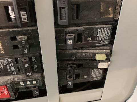 If a circuit breaker is designed for two conductors, it will say so right on