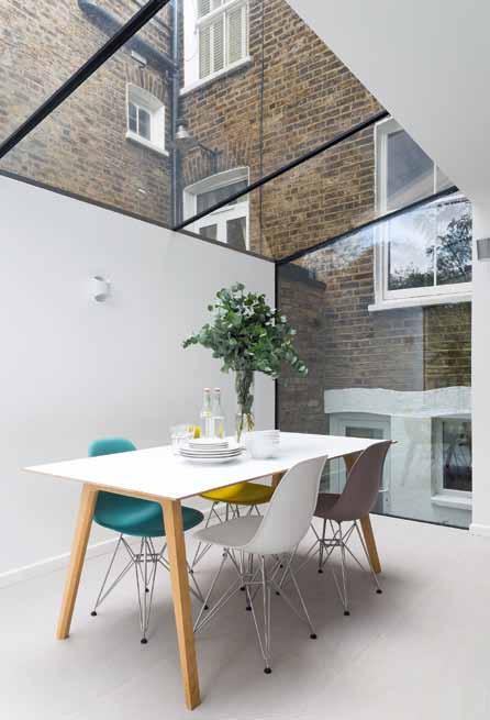 We just love to sit around the table on a beautiful day and look up at the sky ON REFLECTION Above The glass roof has three panels with minimal framing, allowing maximum natural light into the new