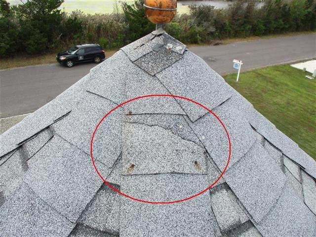 Page 27 of 36 1.0 Item 2(Picture) Damaged roof shingle 1.