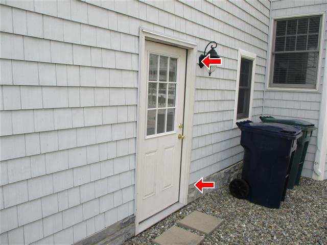 Page 7 of 36 2.1 I recommend that a storm door be installed at the side garage entry door as it will protect the door framing from moisture intrusion. 2.1 Item 1(Picture) Garage entry door The exterior of the home was inspected and reported on with the above information.