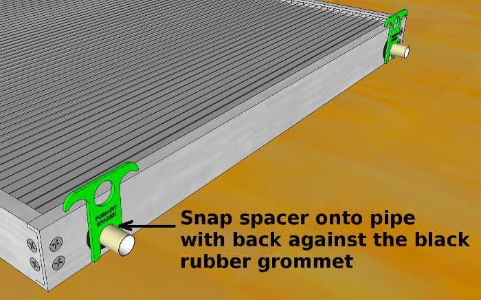 The spacers snap onto the pipes as shown in these diagrams: With the spacers in