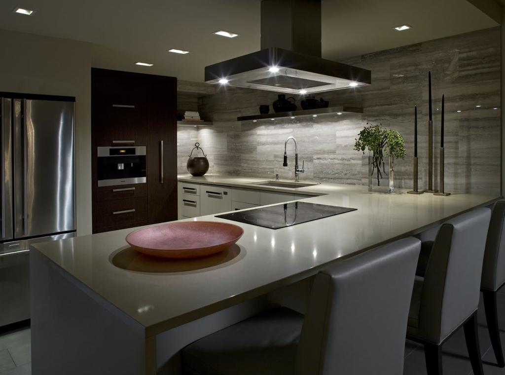 DESIGN The recessed lights, including those in the range hood, are on separate dimmer switches to create various moods.