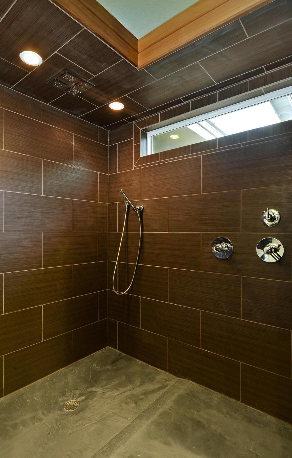 Recessed lighting added in shower showcases fixtures and