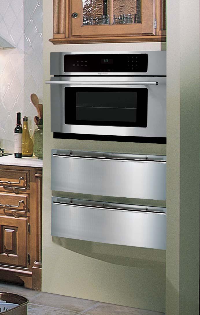p32_47_wallovens 1/3/05 7:28 PM Page 42 WALL OVEN COMPLEMENTS Jenn-Air products offer a variety of options that enable you to customize your kitchen to fit your cooking style.