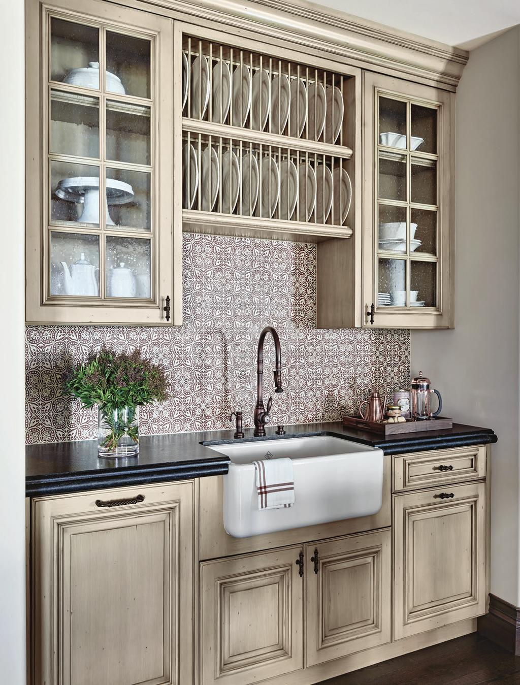 THIS PHOTO: A second apron-front sink in a run of cabinets is just steps from the outer island.
