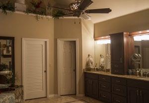 shower, beautiful cabinets and fixtures,