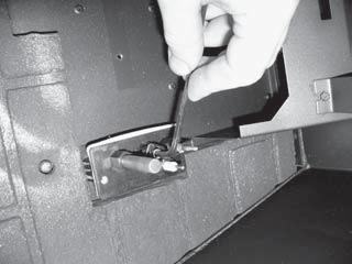 Pilot Shield 13) Remove the pilot head from the assembly using a fl at head screw driver to pop out.