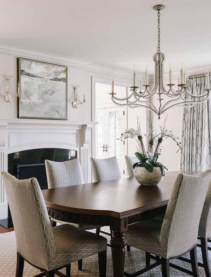 Though most of the home features new furniture and accessories, Laura Archibald kept the homeowners existing dining room table but updated