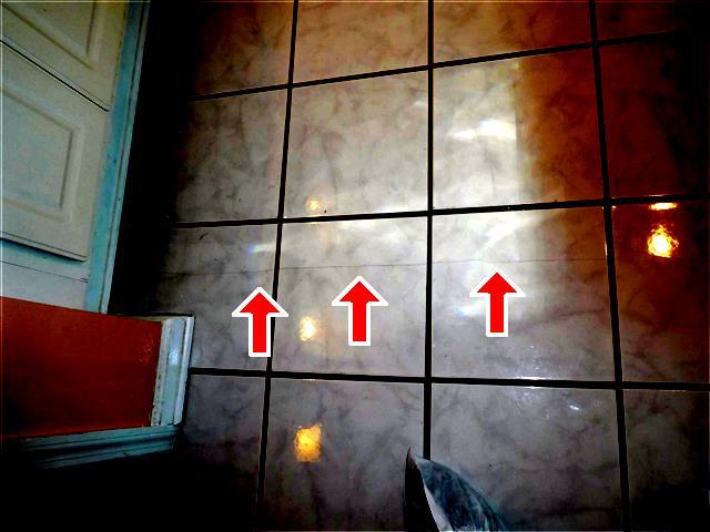 Note: Not all areas of cracked tile are pictured. 4.
