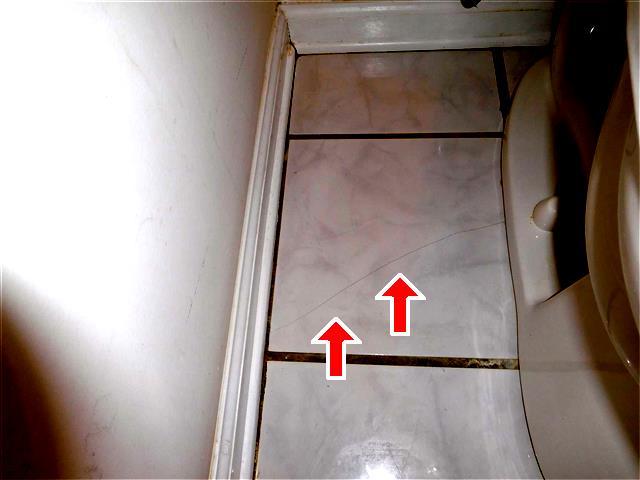 2 Item 3(Picture) (3) Discoloration noted on flooring in front