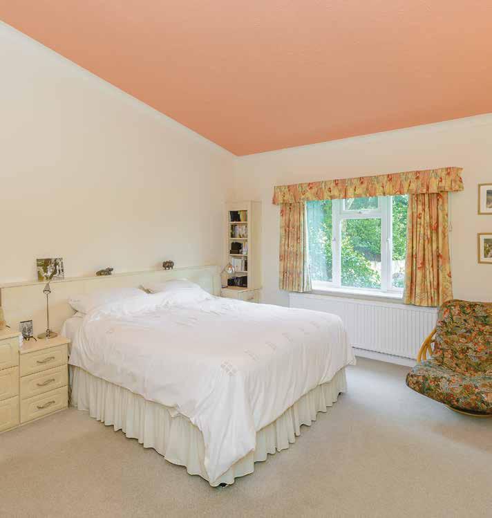 The master bedroom suite comprises a generous double bedroom, a dressing room with ceiling height wardrobes and a bathroom