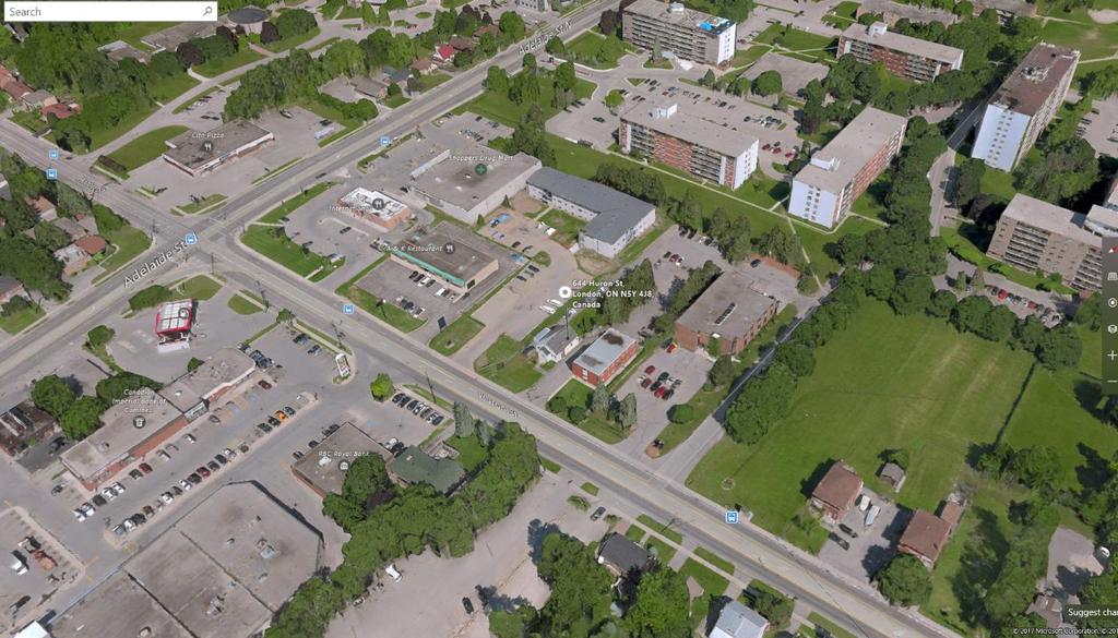 2.0 SITE DESCRIPTION AND SURROUNDING LAND USES 2.1 SUBJECT LANDS The subject site is approximately 0.3540 ha (23540 square meters) in a rectangle shape with 3.53 meters of frontage on Huron Street.
