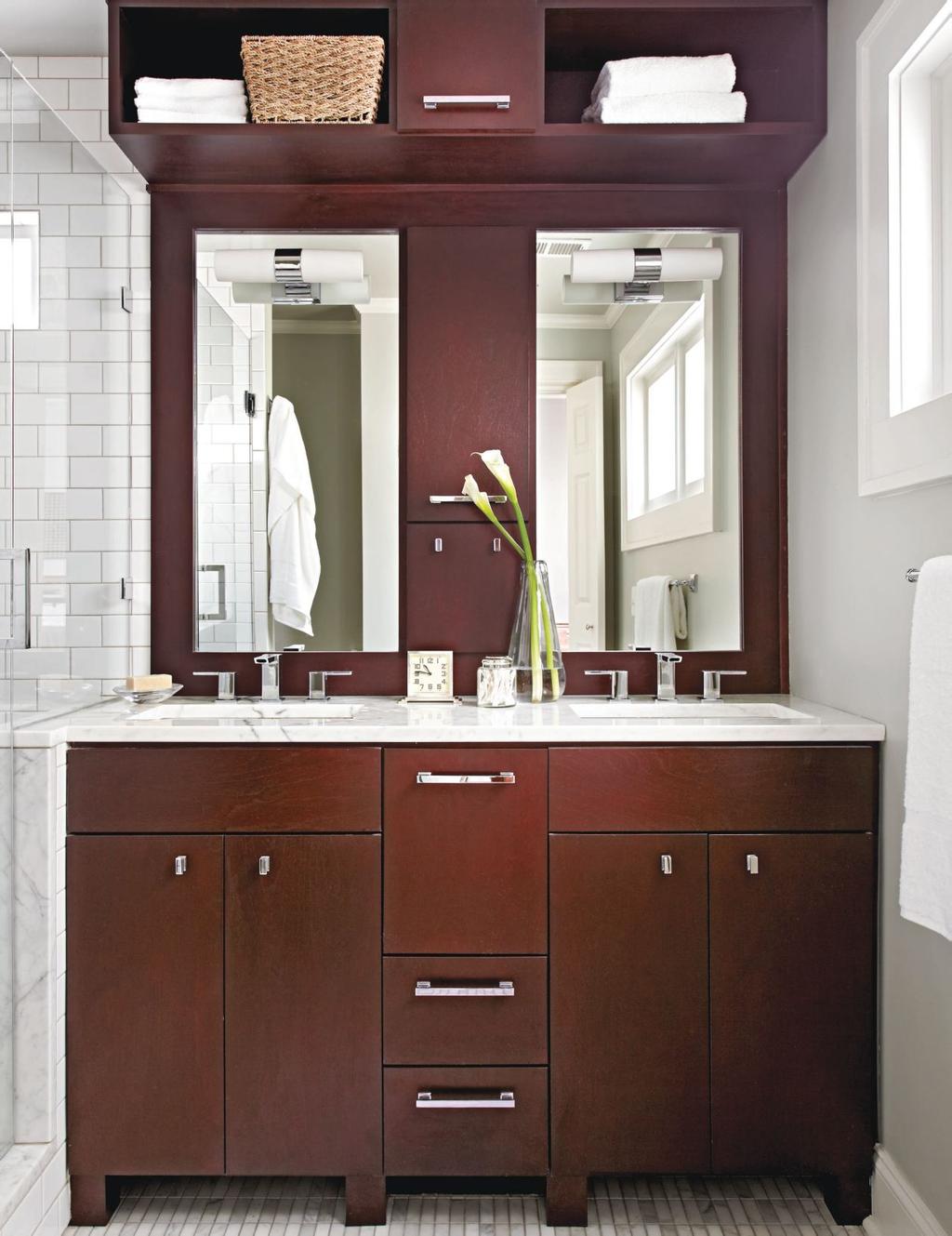 THIS PHOTO: The bathroom may be small, but that vanity is a workhorse, says architect Ili Nilsson, who designed the custom unit with two sinks, storage galore,