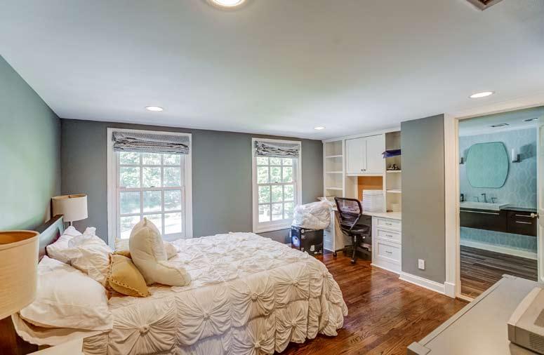 Bedroom #3: hardwood floors, double closet, recessed lighting and two new windows with custom shades.