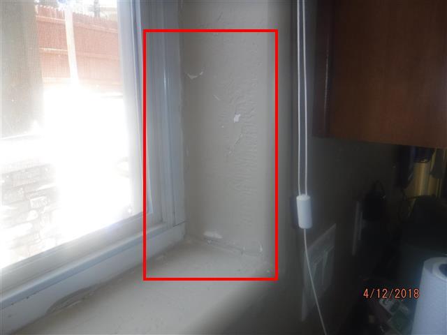 (2) At the window sill over the kitchen sink, we observed some worn paint likely from a combination of sun shine and condensation during the different