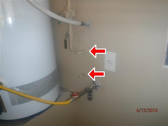 (2) FYI: In the garage near the water heater, there is are some sealed copper water pipe ends protruding from the wall.