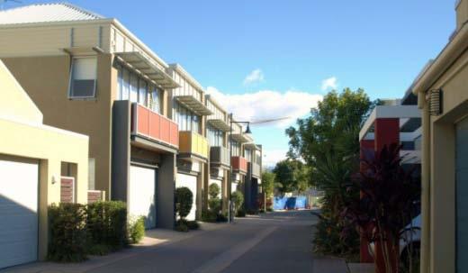 Section indicating typical medium-high density residential development Example of garage-top studios/townhouses to a rear lane.