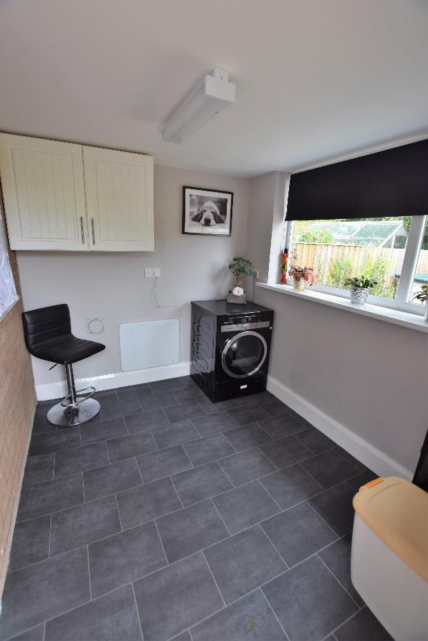 Outside to the rear are two extensive partially enclosed decked areas, gravelled areas, blocked paved seating areas and further paved seating area, additional enclosed gravelled area