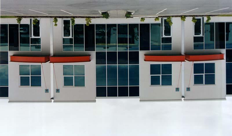 2. Principal facades shall be articulated with glazing or other relief not less than 30