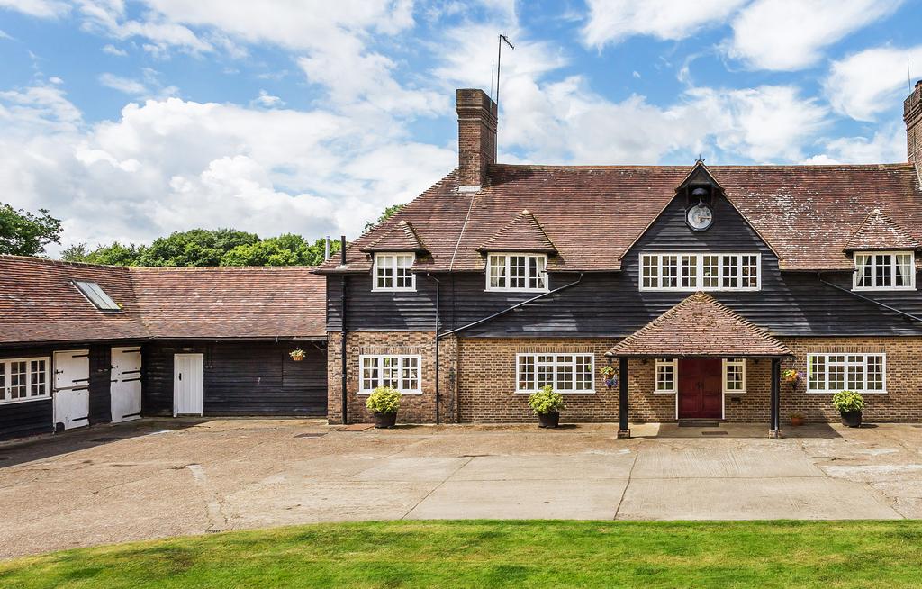 Within an Area of Outstanding Natural Beauty, a charming former coach house to Bolebrook Castle set within extensive grounds