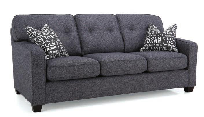 Narrow track arms and simple tufted back cushions define its sleek modern style.