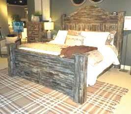 finds Finish is rustic brown replicated pine grain with a worn through paint look Mansion style bed makes a grand statement and offers footboard storage Panel bed features