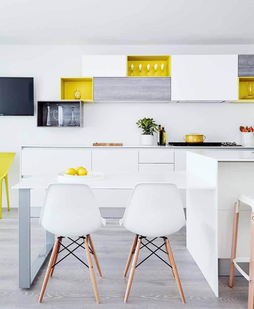 TEXT IRIS BENAROIA PHOTOGRAPHY MICHAEL GRAYDON STYLING CHRISTINE HANLON A real estate developer s modern home boasting a city-chic kitchen is the essence of sleek serenity.