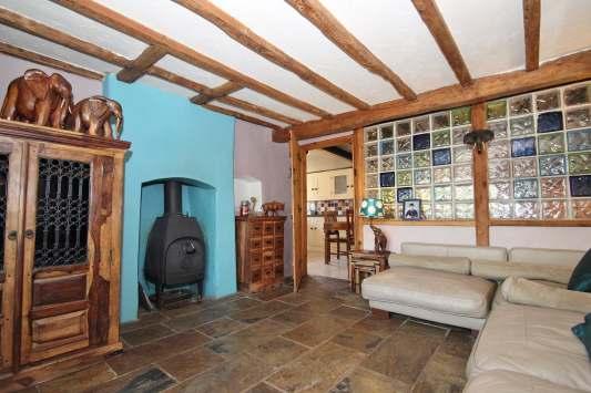 A charming two bedroomed semi detached period cottage of enormous character with exposed beams and stonework.