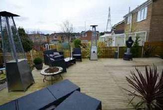 EXTERIOR FRONT Semi open plan and semi enclosed area of garden which is currently laid to flags and EXTRA INFOMATION Please not this property has a fully integrated TV and audio system from a centra