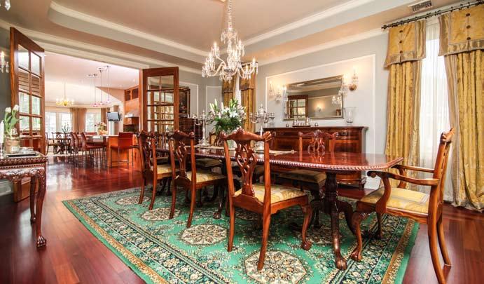 Formal Dining Room: Fabulous for entertaining with surround sound system, wired for chandelier with medallion, tray ceiling, 5 windows with beautiful custom draperies, deep floor and ceiling