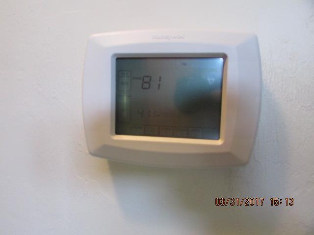 7.9 Item 1(Picture) Thermostat 7.10 Presence of Installed Cooling Source in Each Room The heating and cooling system of this home was inspected and reported on with the above information.