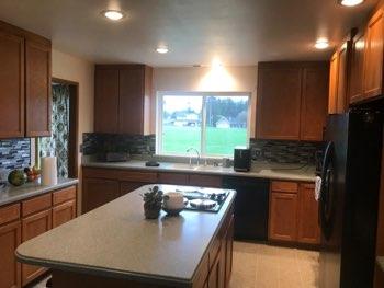 1. Kitchen Room Kitchen Walls and ceilings appear in good condition overall. Flooring is vinyl. Heat register present. Accessible outlets operate. Light fixture operates.