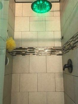 Shower grout absorbs moisture when water comes in contact, recommend sealing