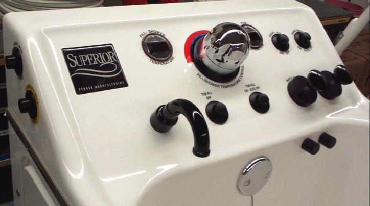 7. Gently pull the resident towards the tub. Carefully lift the resident s legs over the side of the tub and position the resident to face the service deck of the tub.