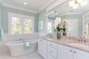 Master bath includes a large soaking tub with a ceramic tile surround (varies per plan) Stephen Alexander is proud to include Windemere faucets by Delta available in Chrome, Brushed Nickel,