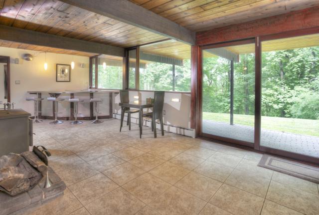 The family room on the ground level opens to a walk out patio.