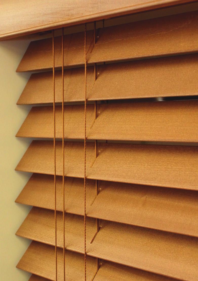Venetian blinds are easy to operate with individual cords to rotate the blades and draw the blind up.