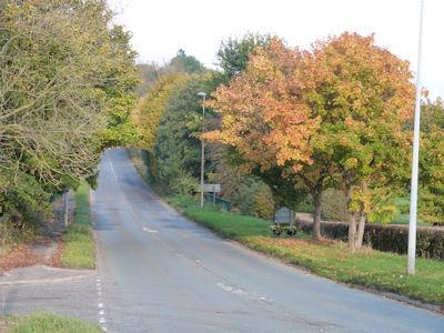 At the bottom of Old Hall Lane, the Avro Golf Course to the south, the former Woodford Aerodrome site to the east and New Hall Farm at the end of the road are outside the Neighbourhood Area,