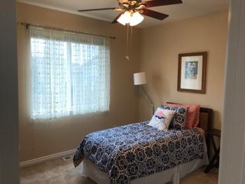 1. Location Location West Bedroom 3 2. Bedroom Room Walls and ceilings appear in good condition overall. Flooring is carpet. Heat register present.