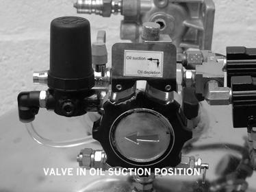 Ensure function switch is in oil suction position. Open air inlet valve to create vacuum in tank (approx 15-25hg).