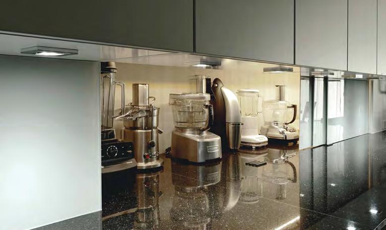 Roll-out shelves make such a diference for storing items in base cabinets, as well as in pantries. Another alternative is an appliance garage, which has evolved from the 1980s connotation.