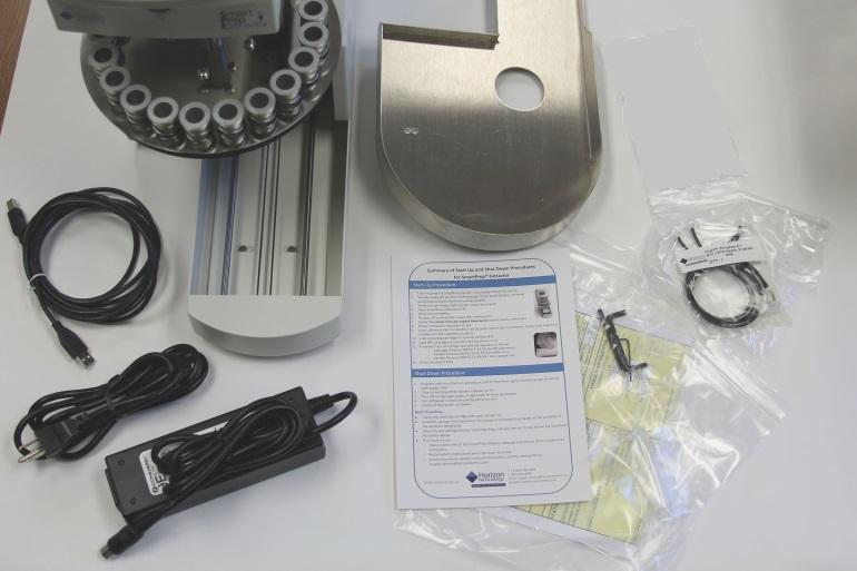 3.2: Unpacking the SmartPrep Module Drip Tray Universal Power Transformer and Cord (100-240 VAC input) USB Connection Cable (module to computer or hub, if multiple units used) Cleaning Cartridge (x1)