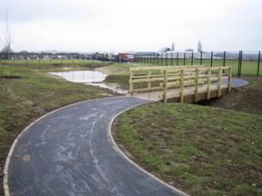Figure 9 The main detention basin with the new pedestrian bridge installed in January 2011.