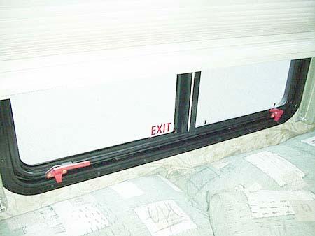 window as an alternate exit. This window will be marked EXIT and have a red-handled latch. Your motorhome may have more than one slideout room.