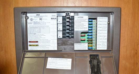 SECTION 6 ELECTRICAL House 12-Volt Fuses (Located on the right-hand side of the power converter) -Typical View The fuse panel accepts only blade type plug-in fuses.