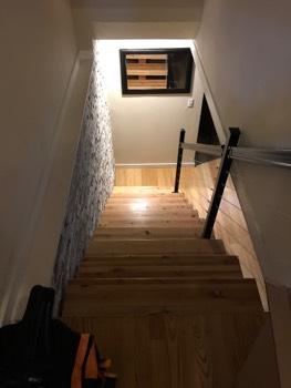 1. Stair Stairs Leading to Basement Steps appeared uniform. Handrail appeared secure.
