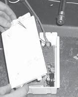 17) Remove the control box cover by undoing the 3 screws. Maneuver through antenna. Antenna Control Box Cover 18) Remove the jumper using a plier.