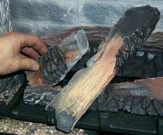Separate platinum embers and place them on the front of the burner on and around the rock wool.